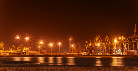 It looks like a commercial seaport at nightの写真素材