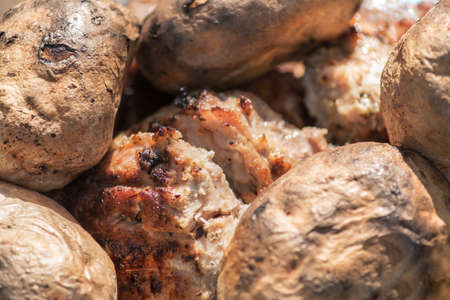 perfectly cooked barbecue potatoes and steakの写真素材