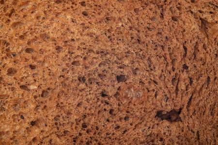 Fragrant freshly prepared slice of toast bread isolated on a white background. Macroの写真素材