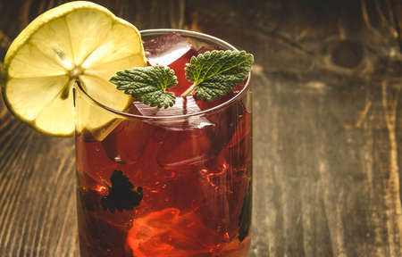 wooden background about red cocktailの写真素材