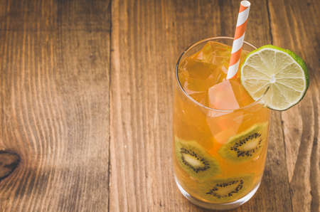 wooden background about yellow cocktail / cocktail on a wooden backgroundの写真素材