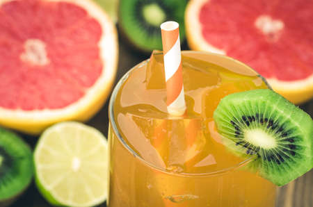 cocktail against the background of fruit / juicy background with abundance of fruit and cocktailの写真素材