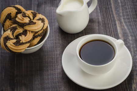 cookies and coffee on a wooden table/cookies and coffee on a wooden table. Top viewの写真素材