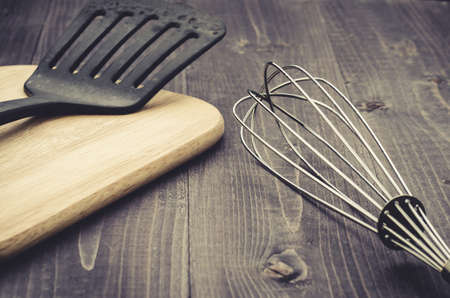 kitchen accessories on a wooden background/kitchen accessories on a wooden background. Selective focus. Tonedの写真素材