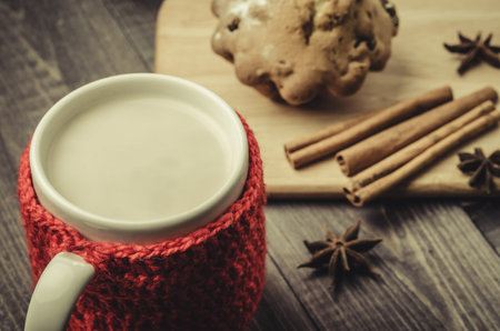 mug with eggnog with seasonings and cake/mug with eggnog with seasonings and cake. Toned. Top view