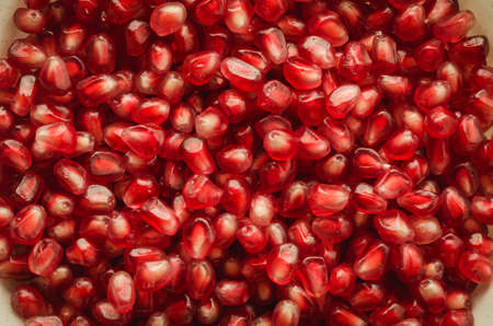 red garnet grains background/background from garnet grains. Top viewの写真素材