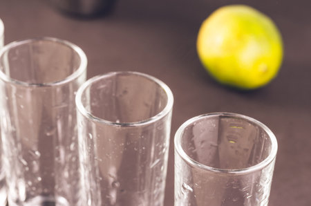 shots ready for alcohol and lime. Selective focus