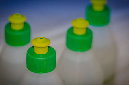 bottles with construction glue/bottles with construction glue, selective focusの写真素材