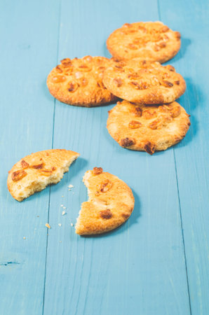 chip cookies with nuts on a blue wooden background/chip cookies with nuts on a blue wooden...