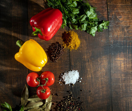 Multicolored peppers, branch of fresh tomatoes cherry cherry, pasta spinach fettuccine, parsley,...