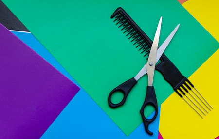 
Scissors and comb. Professional hairdresser scissors for cutting hair on a colored background. Barber equipment concept, premium hairdressing set. Haircuts Accessories with Copy Spaceの写真素材
