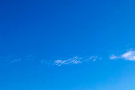Large fluffy white clouds on the sky. Slow motion. Slowly moving clouds.の写真素材