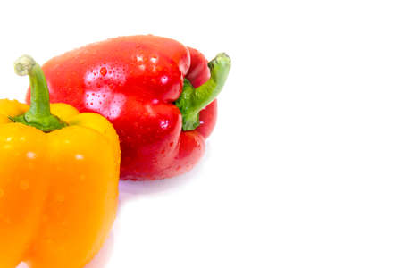Paprika. Red pepper. pepper on white isolated. Sweet red pepper. Full depth of field. Drops of dew and pepper. Free place.の写真素材