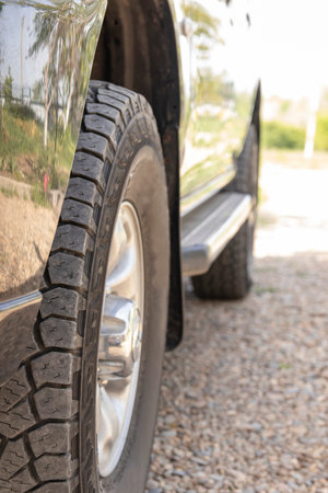 Close-up black tire on a car. Selective focus.
