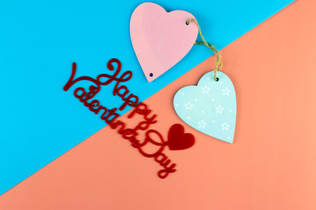 Valentine's Day view from above with copy space. On a colored background, red hearts, hearts...