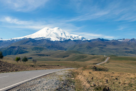 Panoramic view of the slope of Mount Elbrus in the Caucasus Mountains in Russia. Snow-capped peaks.の写真素材