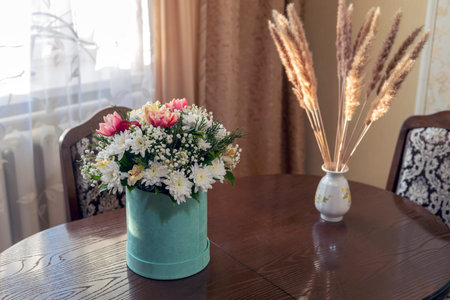 Composition with a bouquet of fresh cut flowers, selective focus.の写真素材