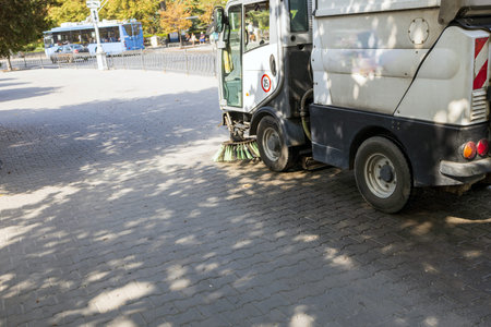 Mechanized cleaning of paths in a park.の写真素材
