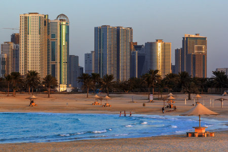 Dubai, UAE - January 7, 2017. View of Sharjah from the beach of Al Mamzar. Sunset. Al Mamzar is one of Dubai's parks. The beach is clean and well-groomed, equipped with changing rooms, toilets and shower cabins. In the park you can engage in active recreaのeditorial素材