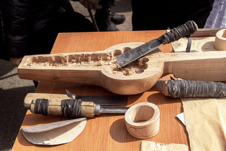 Workshop for the manufacture of Kazakh folk musical instruments. wood carving. Handmade