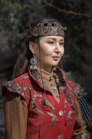 Almaty, Kazakhstan - March 21, 2022 Beautiful girls in national Kazakh clothes. Portrait. close-upのeditorial素材