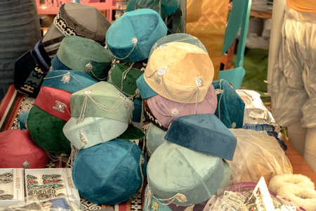Traditional women's Asian headdresses are skullcaps made of thin velveteen with metal decorations. Close-upの写真素材