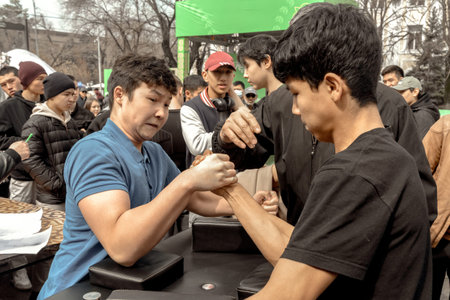 Almaty, Kazakhstan - March 23, 2024. Arm wrestling competition in the city park. Portrait