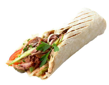 Meat with vegetables wrapped bread cake, tortilla or flat pancake of cornmeal or flourの写真素材
