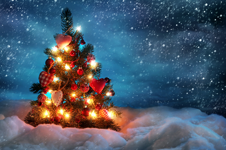 Fir-tree spruce with Christmas decor balls close upの写真素材