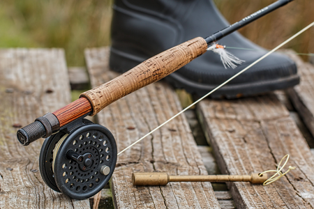 Spinning fishing (lure fishing) trout in lakes of the world. Brook trout (steelhead rainbow trout, char, bull-trout, cutthroat, lax, salmon and pink salmon caught on rotating spinner, close up photographyの写真素材