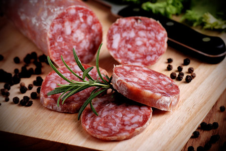 Sliced salami o table close-up view
