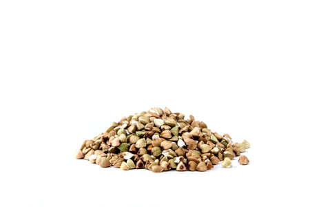 handful of green buckwheat closeup isolated on white backgroundの写真素材