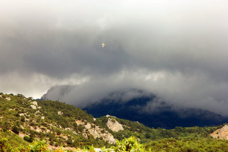 panorama of crimean mountains and thick fog over mountainsの写真素材