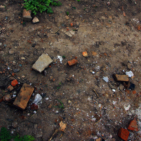 Debris and broken bricks on the ground closeup