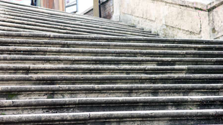 beautiful stone grey Spanish steps in rome in italy foreground closeup in piazza di spagnaの写真素材