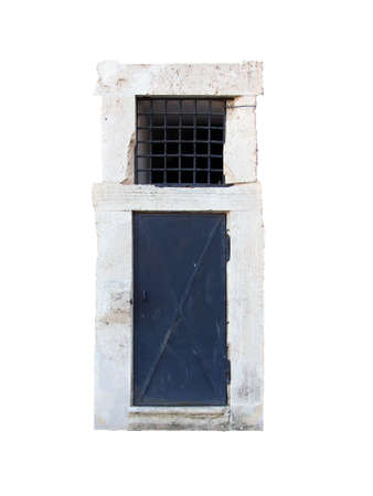 old black metal iron door with white stone marble frame portal isolated on white background closeupの写真素材
