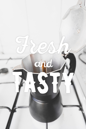 Opened coffee maker and hand drawn quote Fresh and tasty.の写真素材