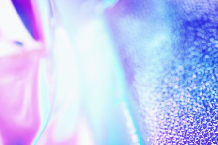Colorful blurred holographic background in ultraviolet neon trendy colorsの写真素材