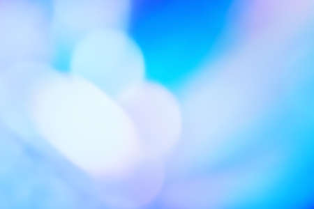 Abstract gradiant wallpaper holographic foil with blurred bokeh light effect. Blur holographic neon foil background.の写真素材