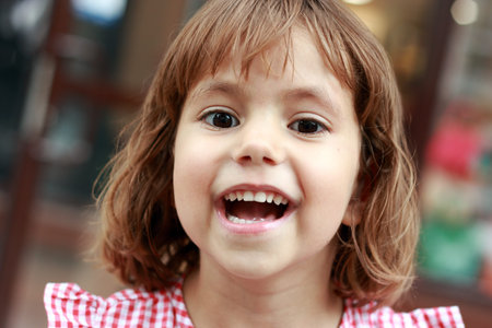 Laughing girl 6 years outdoors  Ð•his is real joy 