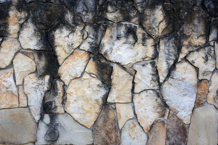 Stone background. Old stone wall from granite.