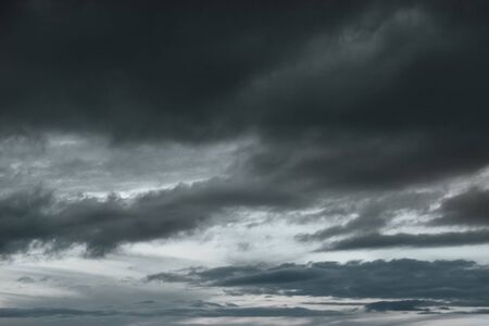 Background of storm clouds before a thunder-storm の写真素材