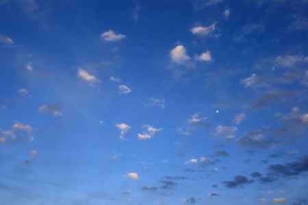 Morning sky over horizon and small clouds の写真素材