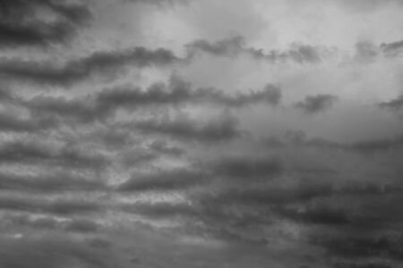 Dark sky and stormy clouds unusual  Dark ominous grey storm clouds の写真素材