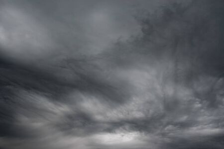 Dark ominous grey storm clouds  Dark storm sky の写真素材
