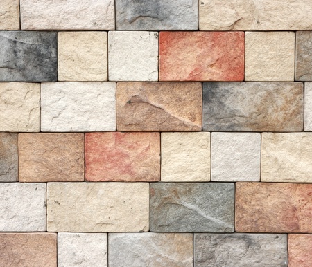 Colorful texture of sandstone brick wall texture の写真素材