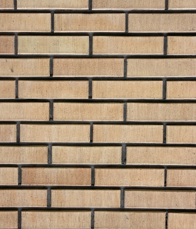Beige brick wall の写真素材