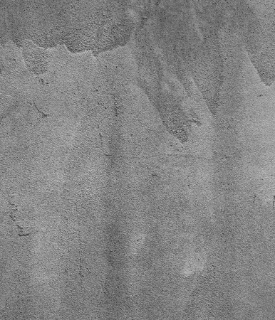 Grey concrete wall  Fragment of a concrete wall may be used as background の写真素材