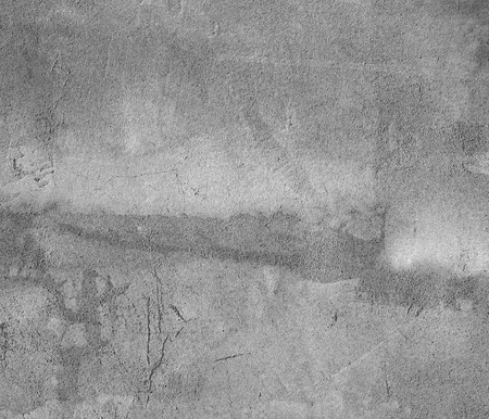 Grey concrete wall with scratches  Fragment of a old concrete wallの写真素材