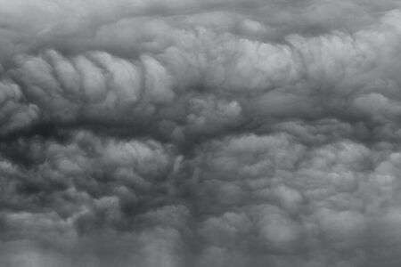 Ominous storm clouds as if armageddon  The grey storm clouds over horizon の写真素材